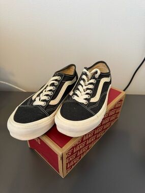 Vans Black and Cream Low-Top Canvas Sneakers